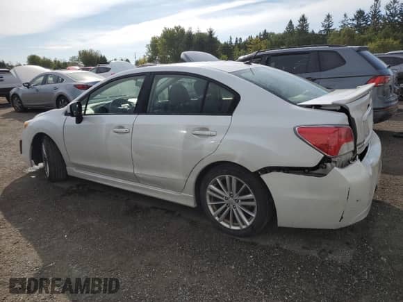2014 Subaru Impreza Premium with VIN JF1GJAD67EH020048, listed as a Copart auction lot 70721245 with 156,661 mi miles and Salvage title. Bid and sale history available at DreamBid. Image 2.