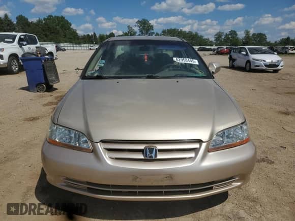 2002 Honda Accord LX с VIN 1HGCG56402A006931, выставлен на аукционе Copart как лот 62958445 с пробегом 125 997 миль миль и Списание • Salvage title. История ставок и продаж доступна на DreamBid. Изображение 5.
