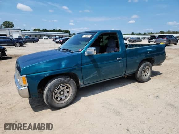 1995 Nissan Frontier with VIN 1N6SD11S3SC358078, listed as a Copart auction lot 71859815 with 118,833 mi miles and Salvage title. Bid and sale history available at DreamBid. Image 1.