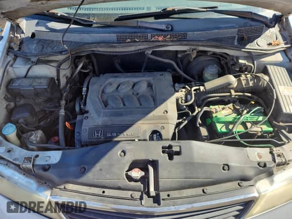 2001 Honda Odyssey EX with VIN 2HKRL18671H602668, listed as a Copart auction lot 82433515 with 254,890 mi miles and Salvage title. Bid and sale history available at DreamBid. Image 12.