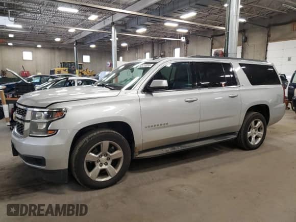 2015 Chevrolet Suburban LT с VIN 1GNSKJKCXFR300348, выставлен на аукционе Copart как лот 82416055 с пробегом 140 250 миль миль и Списание • Salvage title. История ставок и продаж доступна на DreamBid. Изображение 1.