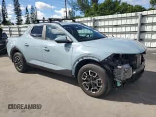 2022 Hyundai Santa Cruz SEL Premium with VIN 5NTJDDAF7NH038582, listed as a Copart auction lot 83921345 with 30,259 mi miles and Salvage title. Bid and sale history available at DreamBid. Image 4.