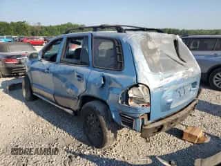 2003 Hyundai Santa Fe GLS с VIN KM8SC73D13U561890, выставлен на аукционе Copart как лот 69398864 с пробегом Не указан миль и Списание • Salvage title. История ставок и продаж доступна на DreamBid. Изображение 2.