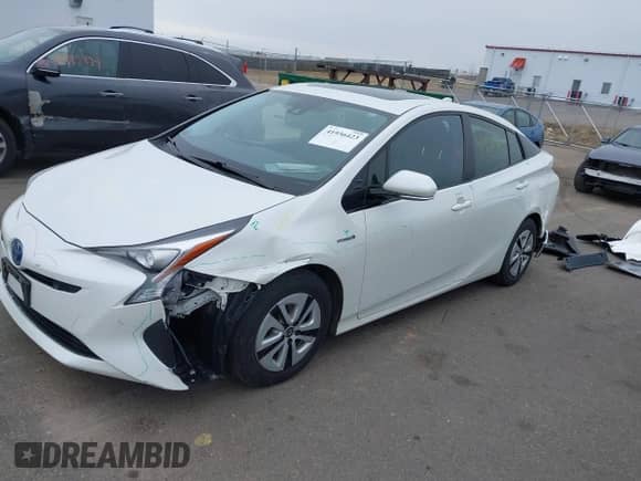 2016 Toyota Prius Four z VIN JTDKARFUXG3026652, wystawiony jako IAAI lot #41936423 z przebiegiem 74 063 mil mil oraz . Historia ofert i sprzedaży dostępna na DreamBid. Obrazek 6.
