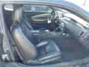 2010 Chevrolet Camaro 2LT z VIN 2G1FC1EV7A9123063, wystawiony jako IAAI lot #43302490 z przebiegiem 176 239 mil mil oraz . Historia ofert i sprzedaży dostępna na DreamBid. Obrazek 5.