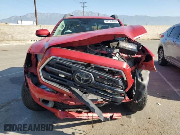 2018 Toyota Tacoma SR5 с VIN 3TMBZ5DN9JM012115, выставлен на аукционе Copart как лот 66775075 с пробегом 62 176 миль миль и Списание • Salvage title. История ставок и продаж доступна на DreamBid. Изображение 5.