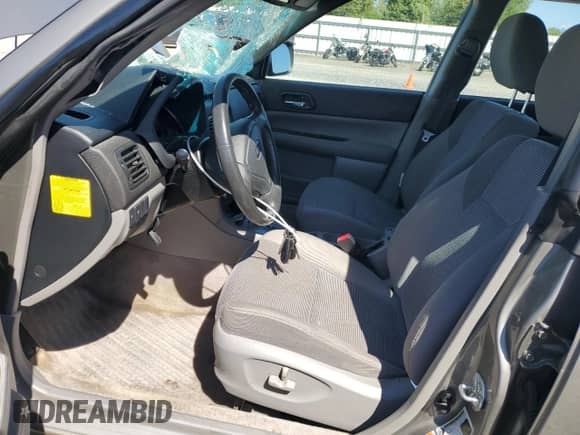 2006 Subaru Forester X with VIN JF1SG65636H744311, listed as a Copart auction lot 63843955 with 108,108 mi miles and Salvage title. Bid and sale history available at DreamBid. Image 7.