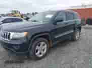 2012 Jeep Grand Cherokee Laredo z VIN 1C4RJEAG1CC229237, wystawiony jako IAAI lot #41613422 z przebiegiem 206 633 mil mil oraz . Historia ofert i sprzedaży dostępna na DreamBid. Obrazek 2.