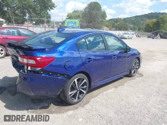 2022 Subaru Impreza Special Sports with VIN 4S3GKAM69N3609896, listed as a IAAI auction lot 43112704 with 30,790 mi miles and . Bid and sale history available at DreamBid. Image 4.