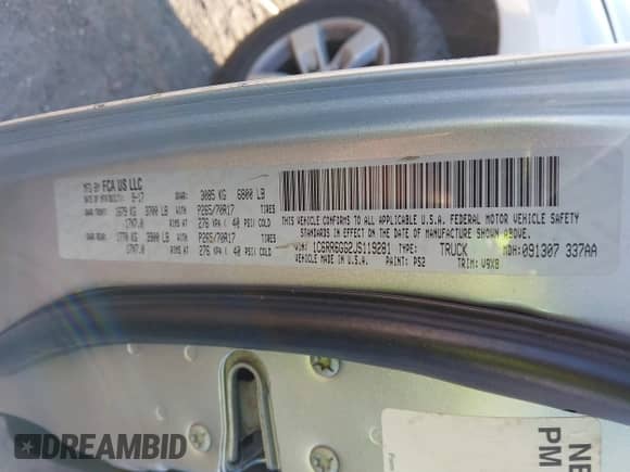 2018 Ram 1500 SLT with VIN 1C6RR6GG2JS119281, listed as a IAAI auction lot 41897492 with 242,877 mi miles and . Bid and sale history available at DreamBid. Image 9.