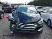 2015 Hyundai Santa Fe z VIN 5XYZWDLA2FG245029, wystawiony jako IAAI lot #42021999 z przebiegiem 135 021 mil mil oraz . Historia ofert i sprzedaży dostępna na DreamBid. Obrazek 12.