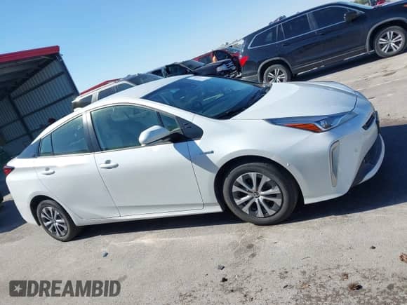 2021 Toyota Prius LE with VIN JTDL9MFU8M3029027, listed as a IAAI auction lot 43354130 with 66,497 mi miles and . Bid and sale history available at DreamBid. Image 13.
