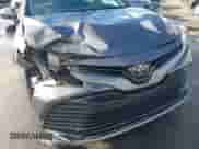 2019 Toyota Camry SE z VIN 4T1B11HK6KU831382, wystawiony jako IAAI lot #43426768 z przebiegiem 137 060 mil mil oraz . Historia ofert i sprzedaży dostępna na DreamBid. Obrazek 6.