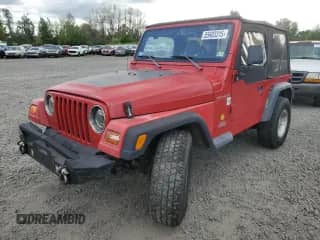 1998 Jeep Wrangler SE with VIN 1J4FY29P8WP767006, listed as a Copart auction lot 55603315 with 146,169 mi miles and Salvage title. Bid and sale history available at DreamBid. Image 1.