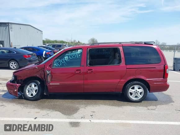 2004 Chevrolet Venture LT z VIN 1GNDX13E34D268072, wystawiony jako IAAI lot #42092031 z przebiegiem 160 153 mil mil oraz . Historia ofert i sprzedaży dostępna na DreamBid. Obrazek 14.