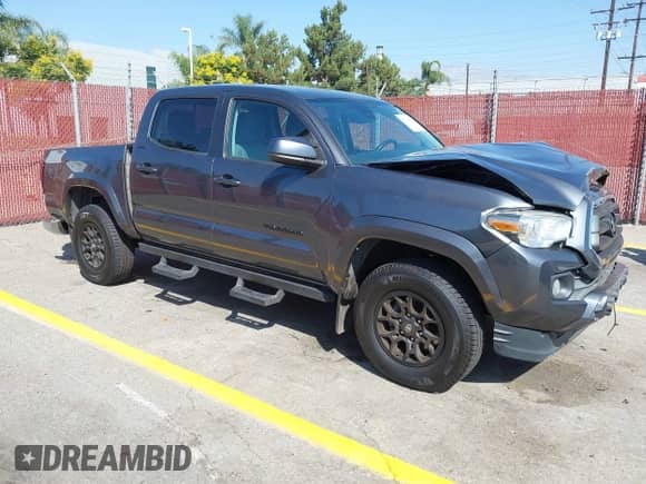 2022 Toyota Tacoma SR5 with VIN 3TMAZ5CN2NM174087, listed as a IAAI auction lot 43204600 with 68,360 mi miles and . Bid and sale history available at DreamBid. Image 1.