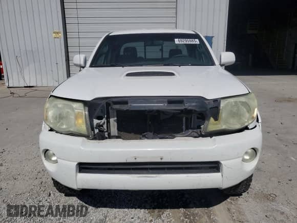 2005 Toyota Tacoma с VIN 5TEUU42N25Z144596, выставлен на аукционе Copart как лот 69295985 с пробегом 285 923 миль миль и Списание • Salvage title. История ставок и продаж доступна на DreamBid. Изображение 5.