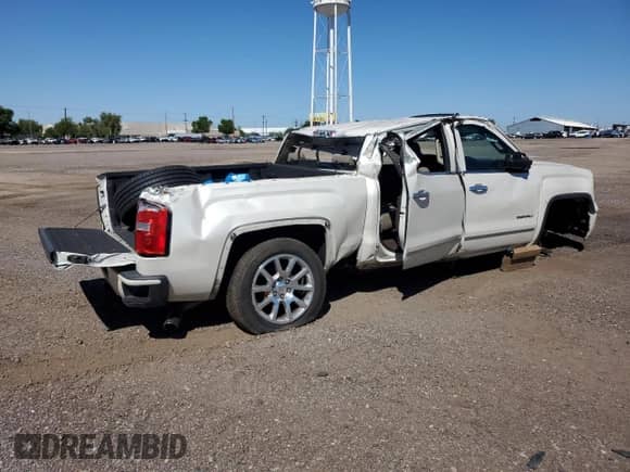 2015 GMC Sierra 1500 Denali z VIN 3GTU2WEC1FG320062, wystawiony jako Copart lot #81668345 z przebiegiem 132 850 mil mil oraz Szkoda całkowita • Salvage title. Historia ofert i sprzedaży dostępna na DreamBid. Obrazek 3.