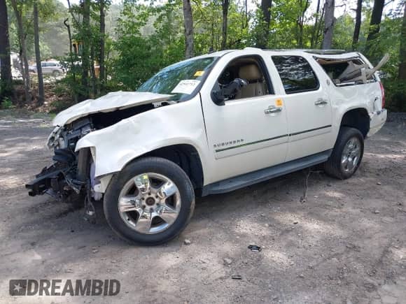 2010 Chevrolet Suburban LTZ with VIN 1GNUKKE36AR269859, listed as a IAAI auction lot 42541712 with 250,891 mi miles and . Bid and sale history available at DreamBid. Image 2.