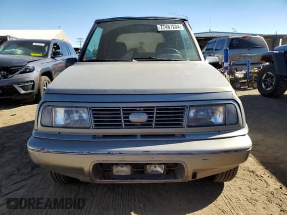 1995 Chevrolet Tracker с VIN 2CNBJ186XS6926688, выставлен на аукционе Copart как лот 77487204 с пробегом 17 598 миль миль и Списание • Salvage title. История ставок и продаж доступна на DreamBid. Изображение 5.