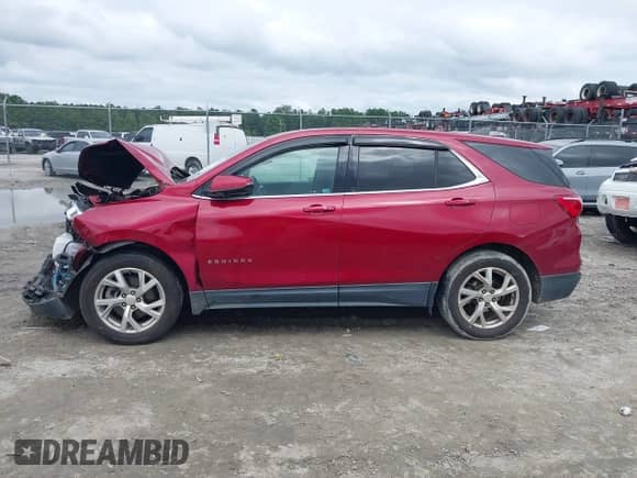2018 Chevrolet Equinox LT with VIN 2GNAXTEX7J6169522, listed as a IAAI auction lot 42892720 with 82,435 mi miles and . Bid and sale history available at DreamBid. Image 14.