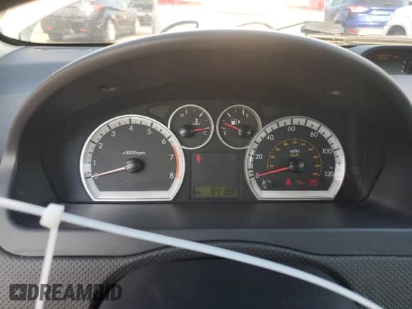 2010 Chevrolet Aveo 1LT с VIN KL1TD6DE0AB103555, выставлен на аукционе Copart как лот 72993294 с пробегом 84 188 миль миль и Списание • Salvage title. История ставок и продаж доступна на DreamBid. Изображение 9.