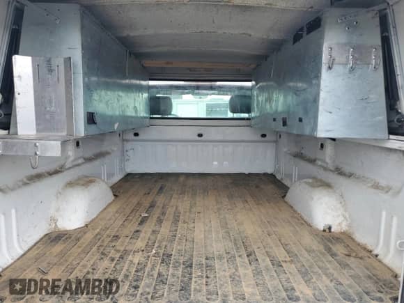 2013 Chevrolet Silverado 1500 Work Truck z VIN 1GCNCPEX2DZ151886, wystawiony jako Copart lot #58527265 z przebiegiem Nie podano mil oraz Czysty tytuł • Clean title. Historia ofert i sprzedaży dostępna na DreamBid. Obrazek 10.