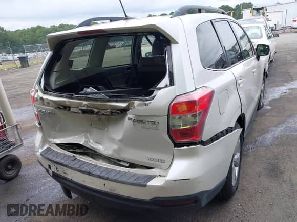 2014 Subaru Forester Touring z VIN JF2SJAPC7EH536627, wystawiony jako IAAI lot #42862912 z przebiegiem 114 727 mil mil oraz . Historia ofert i sprzedaży dostępna na DreamBid. Obrazek 16.