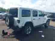 2022 Jeep Wrangler Unlimited Sahara Altitude with VIN 1C4HJXEG9NW252543, listed as a IAAI auction lot 42679875 with 39,913 mi miles and . Bid and sale history available at DreamBid. Image 4.