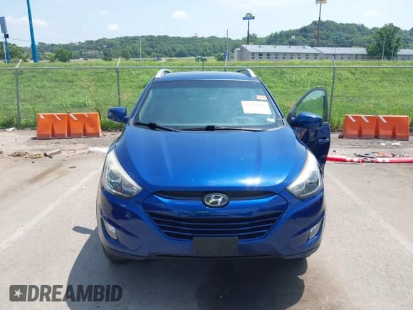 2015 Hyundai Tucson SE with VIN KM8JU3AG6FU987366, listed as a IAAI auction lot 42775890 with 84,499 mi miles and . Bid and sale history available at DreamBid. Image 12.