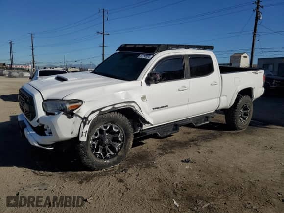 2020 Toyota Tacoma SR5 с VIN 3TMBZ5DN2LM025694, выставлен на аукционе Copart как лот 86754834 с пробегом 72 459 миль миль и Списание • Salvage title. История ставок и продаж доступна на DreamBid. Изображение 1.