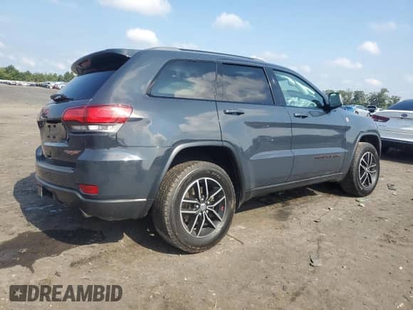 2018 Jeep Grand Cherokee Trailhawk с VIN 1C4RJFLG4JC334712, выставлен на аукционе Copart как лот 68918665 с пробегом 165 519 миль миль и Списание • Salvage title. История ставок и продаж доступна на DreamBid. Изображение 3.