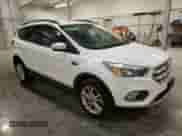 2018 Ford Escape SE with VIN 1FMCU9GD6JUC77191, listed as a Copart auction lot 78548534 with 59,360 mi miles and Salvage title. Bid and sale history available at DreamBid. Image 4.