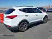 2016 Hyundai Santa Fe with VIN 5XYZU3LBXGG316388, listed as a IAAI auction lot 43215922 with 123,510 mi miles and . Bid and sale history available at DreamBid. Image 4.