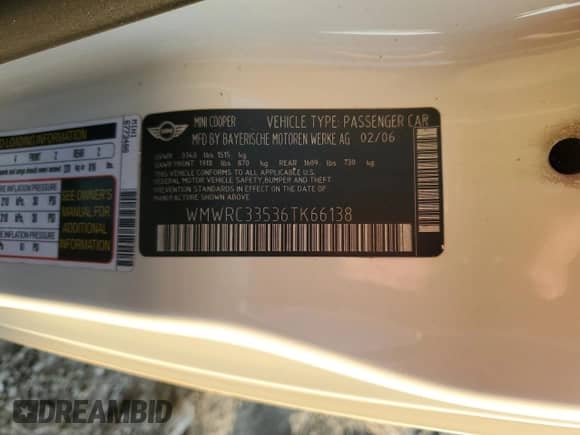 2006 MINI Hardtop with VIN WMWRC33536TK66138, listed as a Copart auction lot 81620335 with 128,877 mi miles and Salvage title. Bid and sale history available at DreamBid. Image 12.
