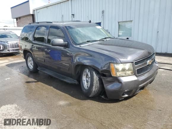 2010 Chevrolet Tahoe LS with VIN 1GNMCAE30AR224049, listed as a Copart auction lot 67772955 with 209,148 mi miles and Salvage title. Bid and sale history available at DreamBid. Image 4.