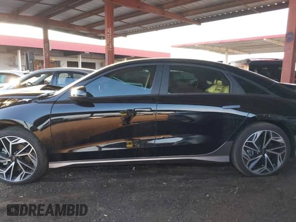 2023 Hyundai Ioniq 6 SEL with VIN KMHM34AA2PA020922, listed as a IAAI auction lot 43075612 with 14,084 mi miles and . Bid and sale history available at DreamBid. Image 15.