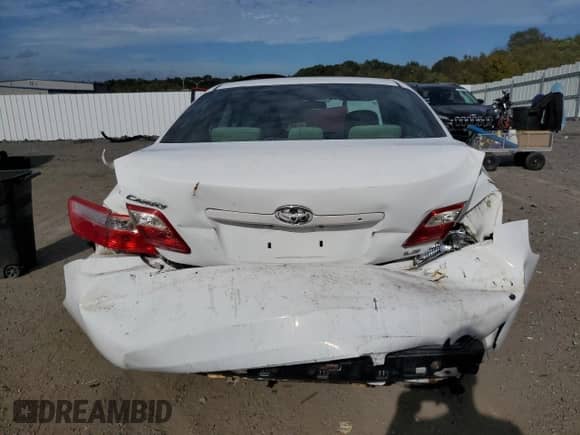 2009 Toyota Camry LE z VIN 4T1BE46KX9U806116, wystawiony jako Copart lot #85261255 z przebiegiem 196 982 mil mil oraz Czysty tytuł • Clean title. Historia ofert i sprzedaży dostępna na DreamBid. Obrazek 6.