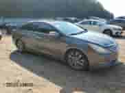 2012 Hyundai Sonata Limited z VIN 5NPEC4AB5CH452697, wystawiony jako Copart lot #81179065 z przebiegiem 104 476 mil mil oraz Szkoda całkowita • Salvage title. Historia ofert i sprzedaży dostępna na DreamBid. Obrazek 4.