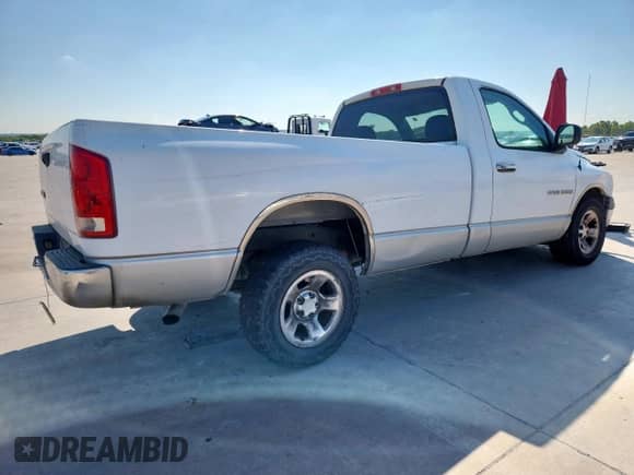 2003 Dodge 1500 ST with VIN 1D7HA16K03J517012, listed as a Copart auction lot 82157155 with 201,443 mi miles and Salvage title. Bid and sale history available at DreamBid. Image 3.