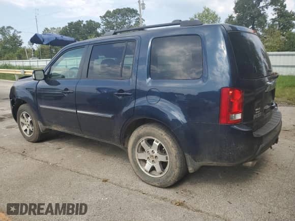 2009 Honda Pilot Touring with VIN 5FNYF48999B016322, listed as a Copart auction lot 71404925 with 205,468 mi miles and Salvage title. Bid and sale history available at DreamBid. Image 2.