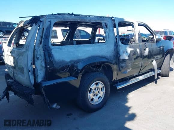 2013 Chevrolet Suburban LS with VIN 1GNSCHE07DR365775, listed as a IAAI auction lot 43024613 with Not provided miles and . Bid and sale history available at DreamBid. Image 4.
