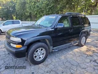 2005 Chevrolet Tahoe LT with VIN 1GNEC13T85R219243, listed as a Copart auction lot 66396395 with 298,084 mi miles and Salvage title. Bid and sale history available at DreamBid. Image 1.