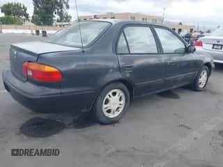 1999 Chevrolet Prizm z VIN 1Y1SK5283XZ412109, wystawiony jako IAAI lot #43342276 z przebiegiem 121 038 mil mil oraz . Historia ofert i sprzedaży dostępna na DreamBid. Obrazek 4.