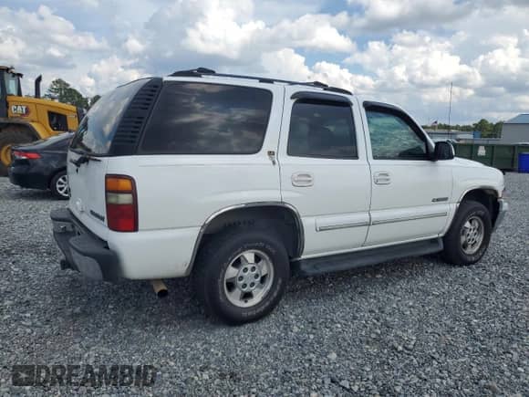 2001 Chevrolet Tahoe LS z VIN 1GNEC13T01R111306, wystawiony jako Copart lot #69078425 z przebiegiem 292 144 mil mil oraz Szkoda całkowita • Salvage title. Historia ofert i sprzedaży dostępna na DreamBid. Obrazek 3.