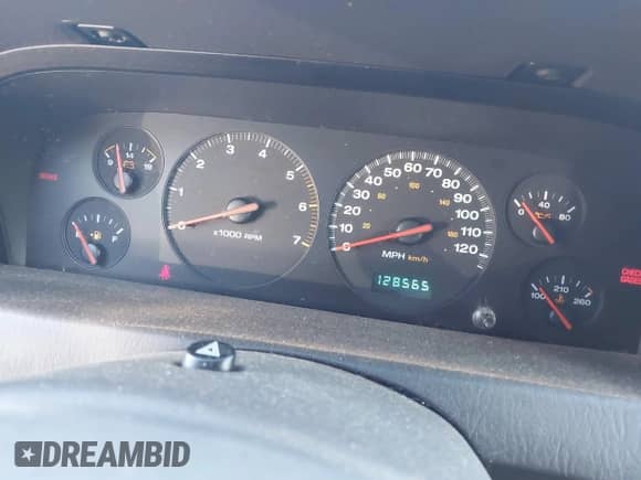 2000 Jeep Grand Cherokee Limited with VIN 1J4GW58N4YC325524, listed as a IAAI auction lot 43245506 with 128,565 mi miles and . Bid and sale history available at DreamBid. Image 7.