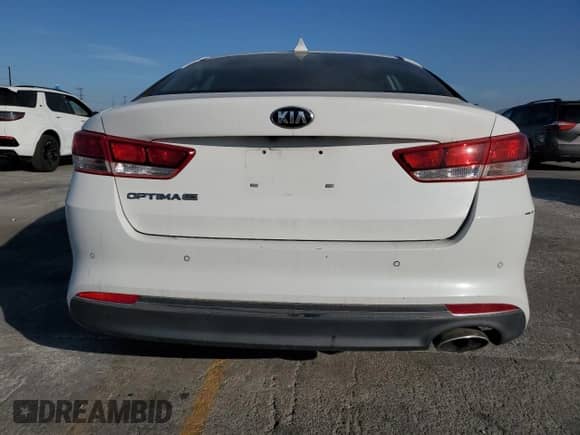 2018 Kia Optima LX z VIN 5XXGT4L34JG239893, wystawiony jako Copart lot #69809485 z przebiegiem 99 966 mil mil oraz Szkoda całkowita • Salvage title. Historia ofert i sprzedaży dostępna na DreamBid. Obrazek 6.