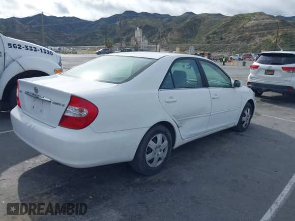 2004 Toyota Camry LE with VIN 4T1BE32KX4U318616, listed as a IAAI auction lot 41923089 with 258,872 mi miles and . Bid and sale history available at DreamBid. Image 4.