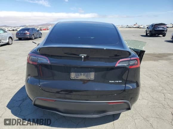 2023 Tesla Model Y Long Range с VIN 7SAYGAEE3PF903721, выставлен на аукционе Copart как лот 68774815 с пробегом Не указан миль и Списание • Salvage title. История ставок и продаж доступна на DreamBid. Изображение 6.