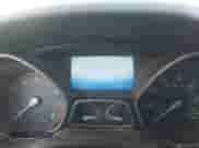 2014 Ford Focus Titanium z VIN 1FADP3N27EL169470, wystawiony jako IAAI lot #43073602 z przebiegiem 244 891 mil mil oraz . Historia ofert i sprzedaży dostępna na DreamBid. Obrazek 7.